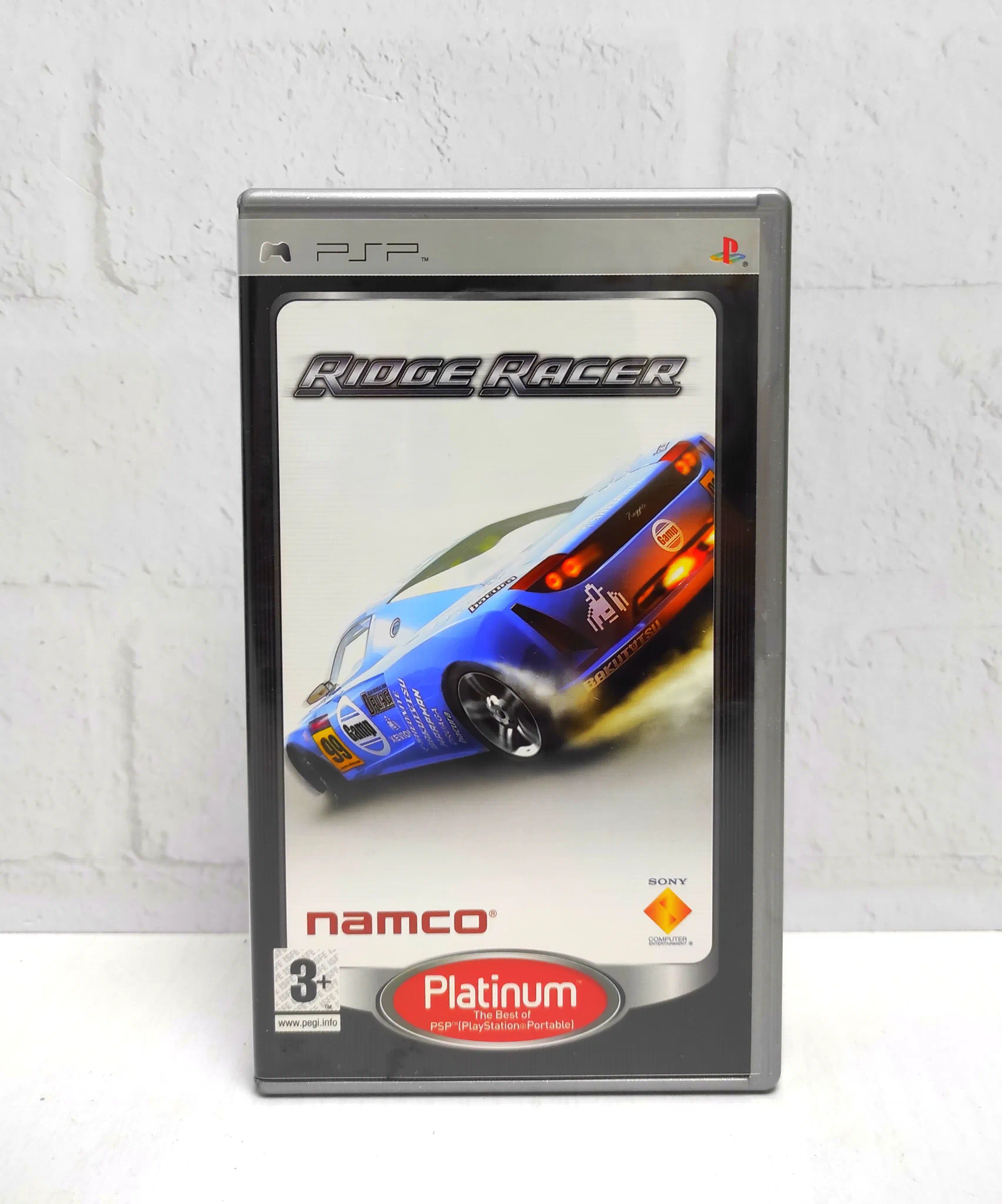 Ridge Racer Английский язык UCES 00002 Видеоигра на диске PSP. Товар уцененный